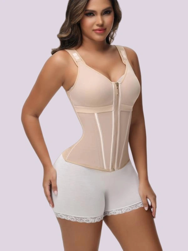 Model wearing a beige compression bodysuit with adjustable straps, a front zipper, and contoured waist-support panels