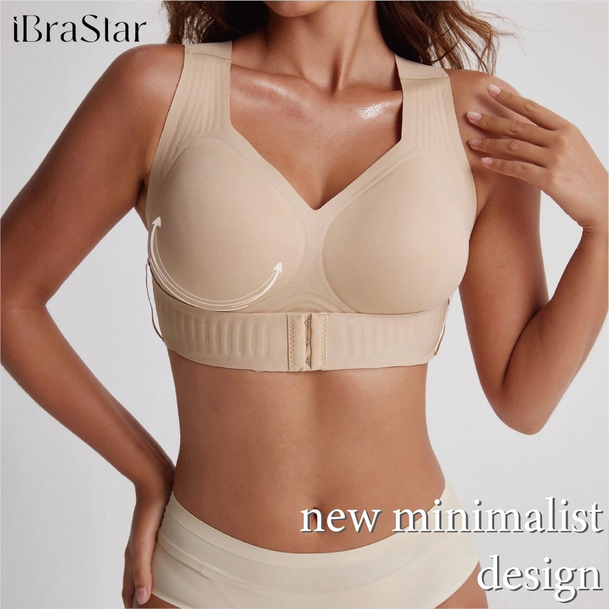 Close-up view of a model wearing a beige support bra with broad shoulder straps, a V-shaped neckline, molded cups, a wide adjustable underband, and a front hook closure, with arrows highlighting the lifting support design.