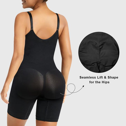 Rear view of a model wearing a fitted black shaping garment, showing adjustable shoulder straps, a smooth back panel, thigh-length coverage, and a contoured rear section designed to create a rounded silhouette.