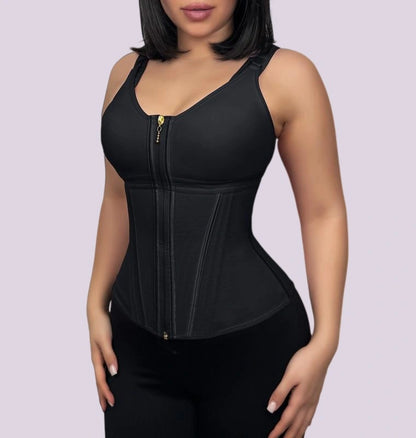 Woman wearing a black shaping bodysuit with a front zipper, wide straps, and contoured panels that define the waistline