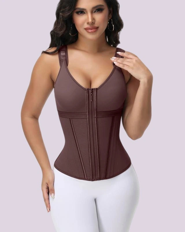Woman wearing a mocha brown shaping bodysuit with adjustable straps, a front zipper, and structured waist-contouring panels