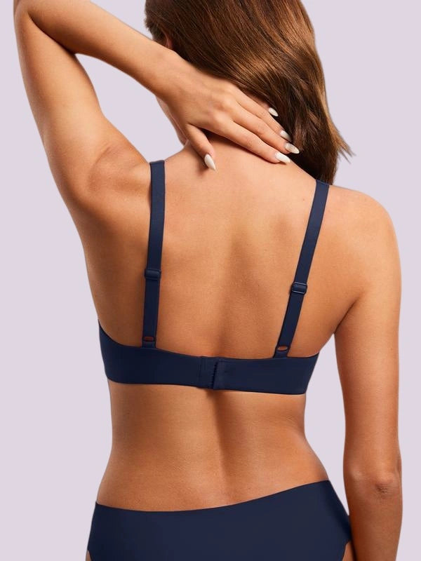 Rear view of a navy bra with slim adjustable straps, a secure back band, and a clean minimalist design for everyday wear