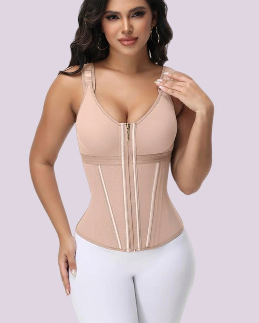 Woman wearing a nude-toned waist-cinching bodysuit with adjustable shoulder straps and structured front panels