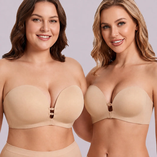 Two women modeling nude-tone strapless bras with smooth molded cups and secure center front clasps.