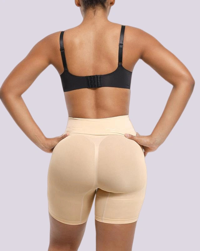 Beige butt lifting shapewear shorts with high waist support and rear contour shaping