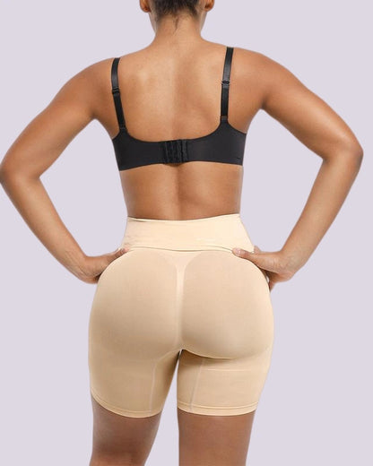 Beige butt lifting shapewear shorts with high waist support and rear contour shaping